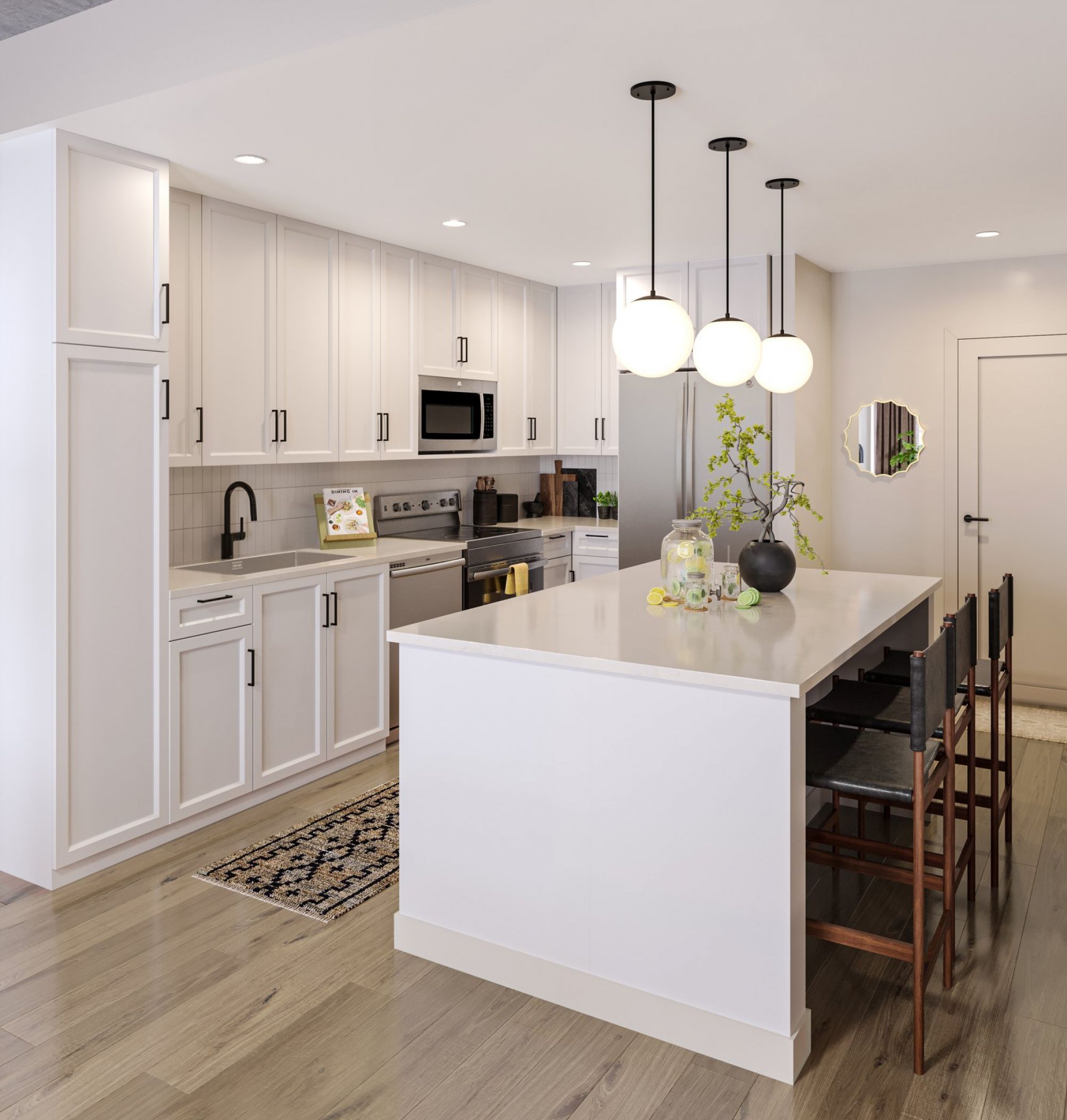 LOCAL Nashville Apartments bright kitchen with white cabinets, stainless steel appliances, and large kitchen island